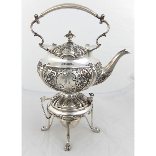 144 - A three piece silver tea service