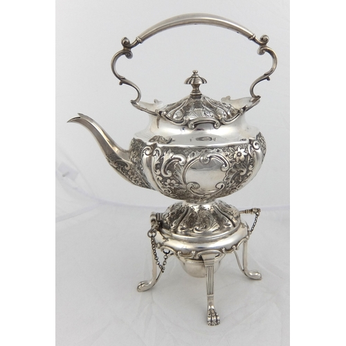 144 - A three piece silver tea service