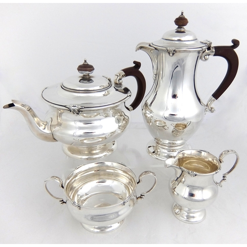 148 - A matched four piece silver tea service