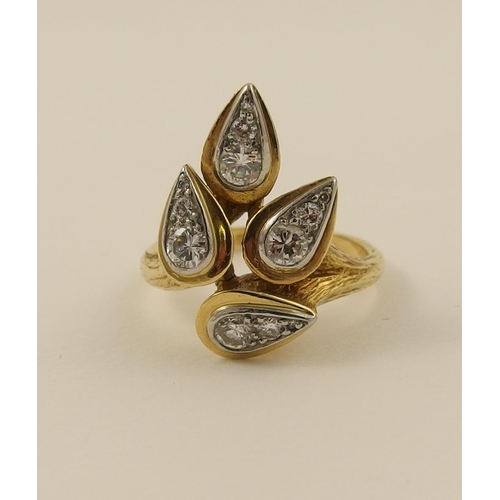 15 - An 18ct diamond set leaf ring