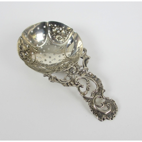 155 - An 18th Century silver sifter spoon