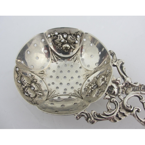 155 - An 18th Century silver sifter spoon