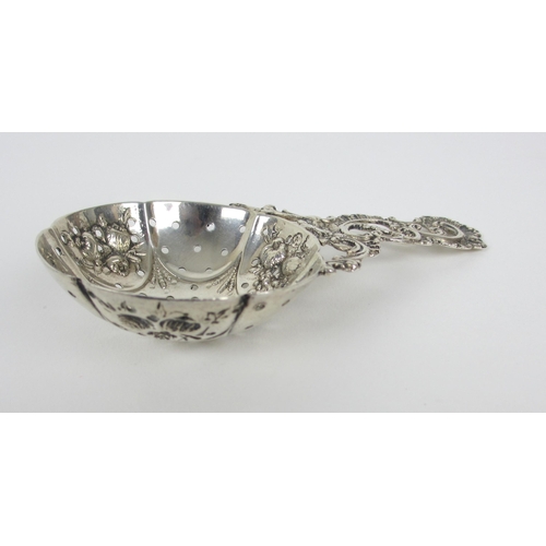 155 - An 18th Century silver sifter spoon