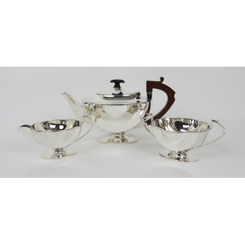 156 - A three piece silver tea service