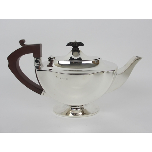 156 - A three piece silver tea service