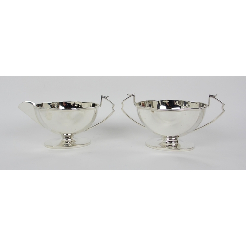 156 - A three piece silver tea service