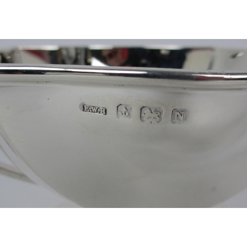 156 - A three piece silver tea service