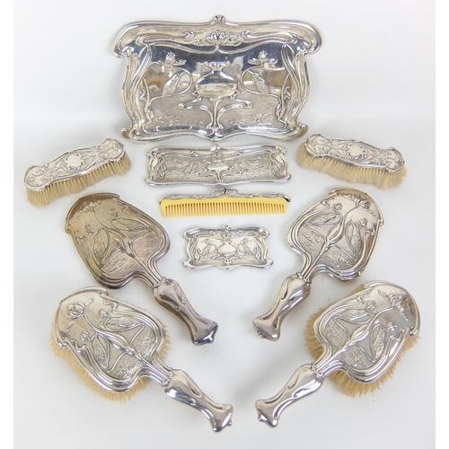 178 - An Art Nouveau silver ten piece dressing table set