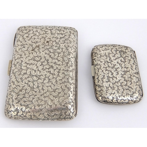 182 - A pair of ladies and gents silver cigarette cases