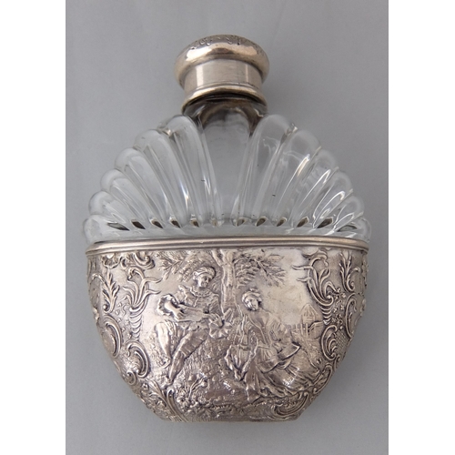 194 - A Continental moulded glass scent bottle