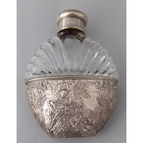 194 - A Continental moulded glass scent bottle