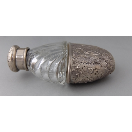 194 - A Continental moulded glass scent bottle