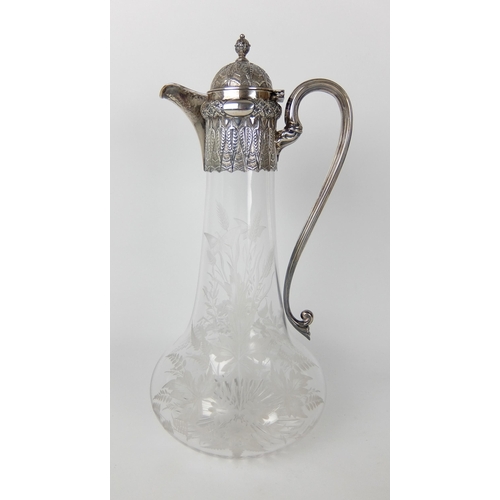 198 - A Victorian silver mounted claret jug