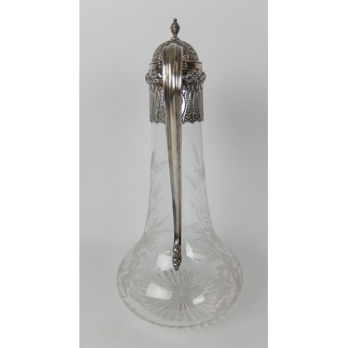 198 - A Victorian silver mounted claret jug