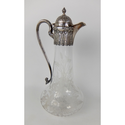 198 - A Victorian silver mounted claret jug