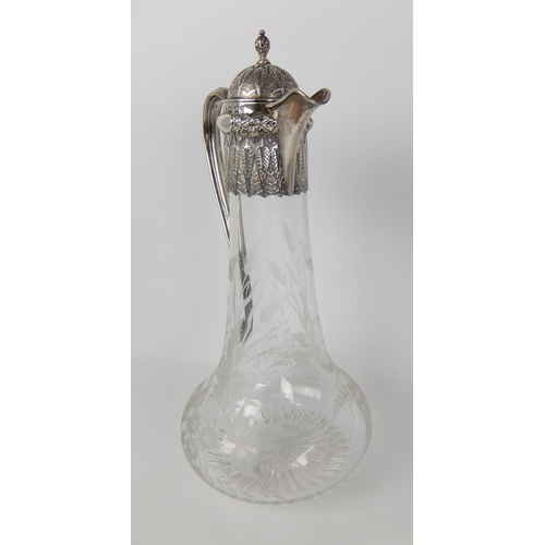 198 - A Victorian silver mounted claret jug