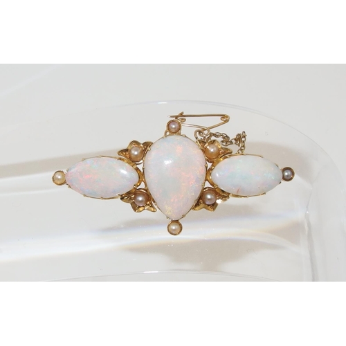 21 - An Edwardian 15ct opal and pearl brooch