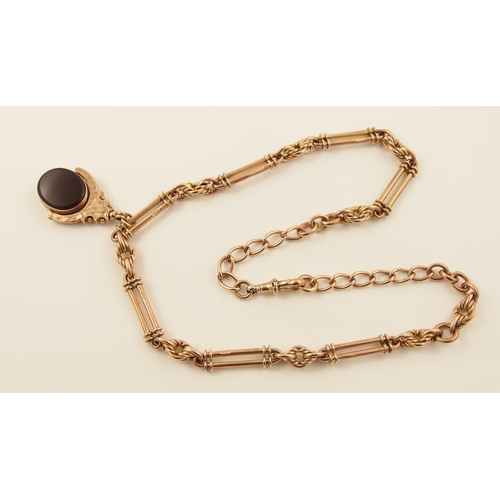 23 - A decorative 9ct rose gold fob chain