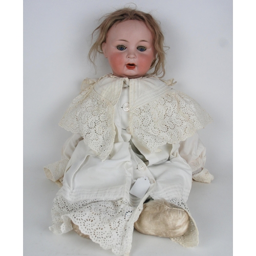 233 - A large bisque-head doll