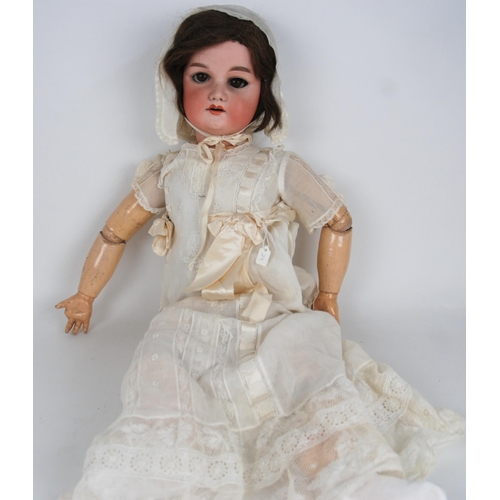 234 - A large Armand Marseille bisque-head doll