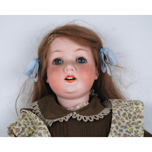 235 - A large Heubach and Koppelsdorf bisque-head doll