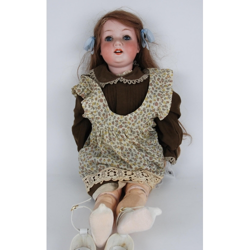 235 - A large Heubach and Koppelsdorf bisque-head doll