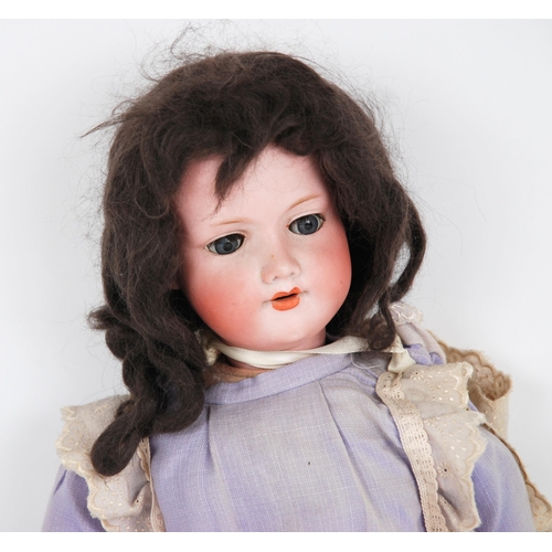 239 - An Armand Marseille bisque-head doll