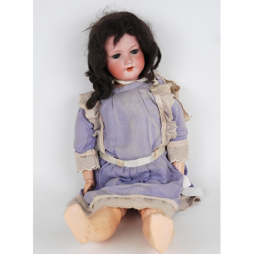 239 - An Armand Marseille bisque-head doll