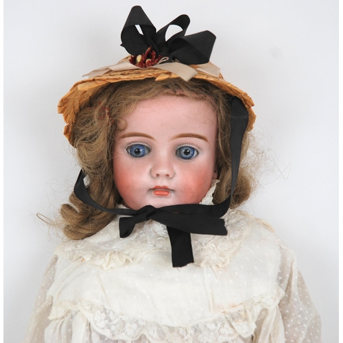 241 - A bisque-head doll