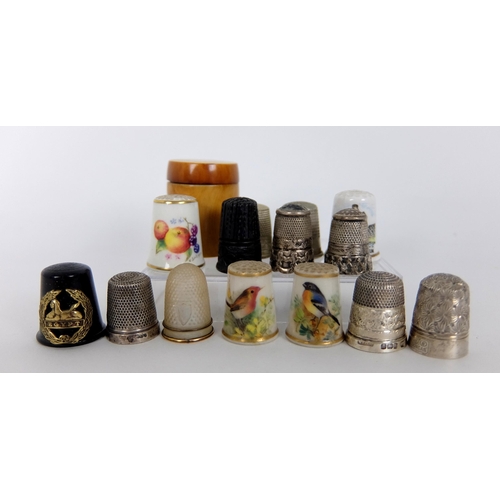 263 - A group of thimbles comprising;