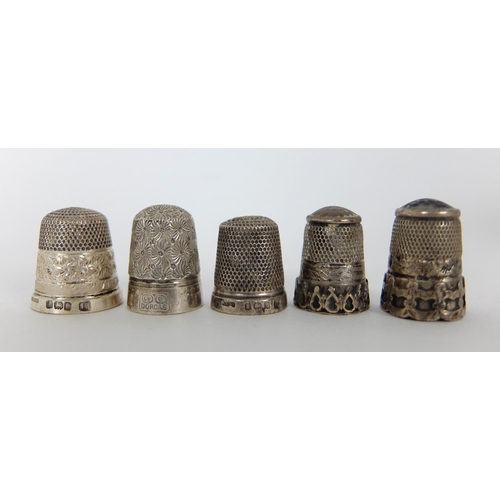 263 - A group of thimbles comprising;