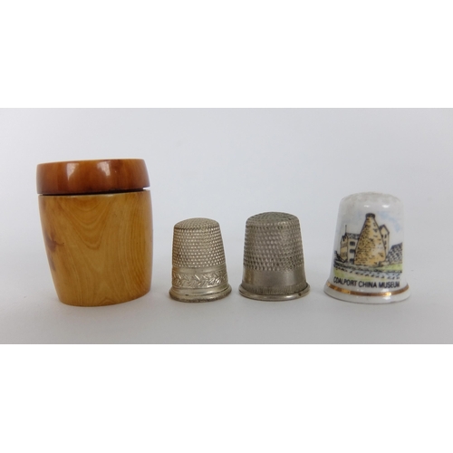 263 - A group of thimbles comprising;