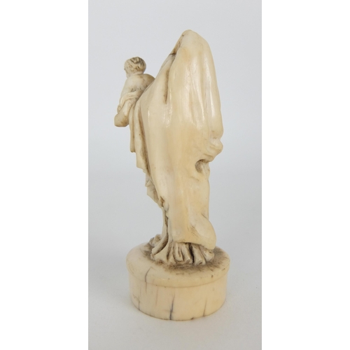 265 - A French ivory carving of The Madonna and child