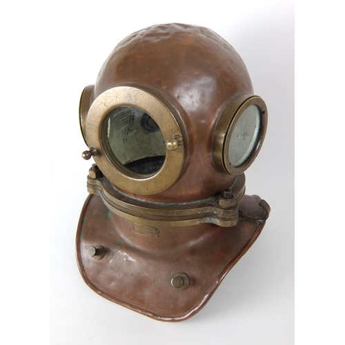 275 - A brass and copper divers helmet