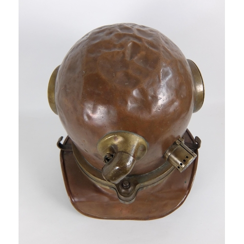 275 - A brass and copper divers helmet