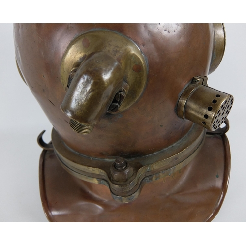 275 - A brass and copper divers helmet