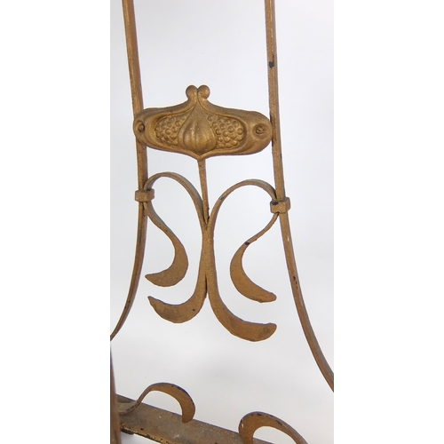 276 - A copper and cast iron Arts and Crafts stick stand