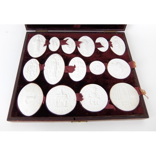 290 - A set of fifteen plaster of Paris oval and circular City of Glasgow seals