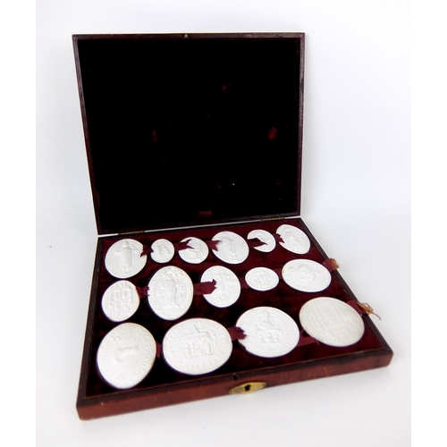 290 - A set of fifteen plaster of Paris oval and circular City of Glasgow seals