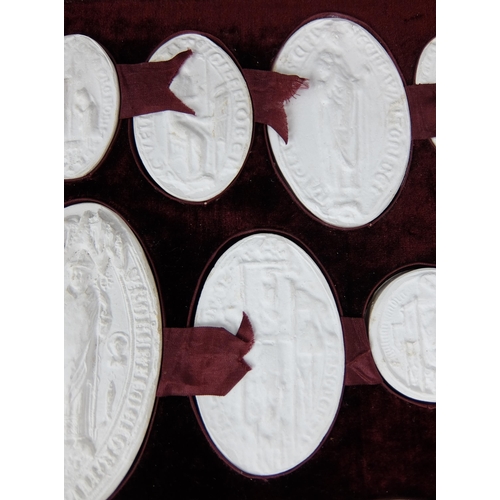 290 - A set of fifteen plaster of Paris oval and circular City of Glasgow seals