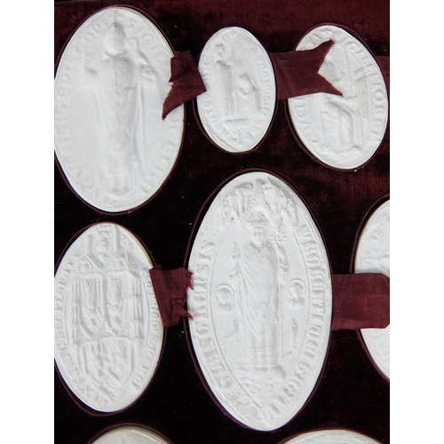 290 - A set of fifteen plaster of Paris oval and circular City of Glasgow seals