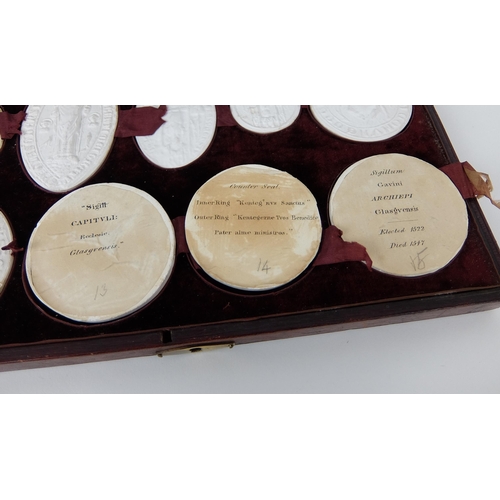 290 - A set of fifteen plaster of Paris oval and circular City of Glasgow seals