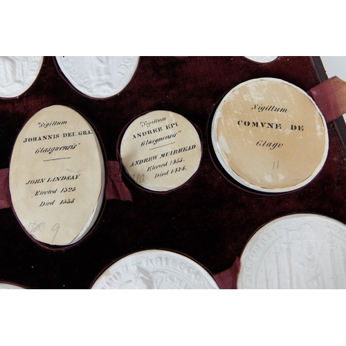 290 - A set of fifteen plaster of Paris oval and circular City of Glasgow seals