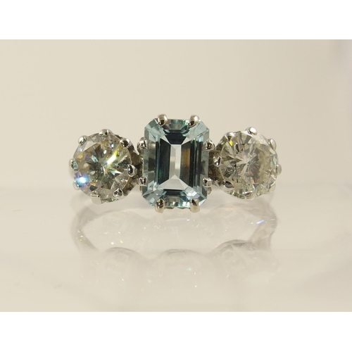 31 - An aquamarine and diamond ring