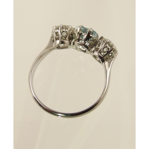 31 - An aquamarine and diamond ring