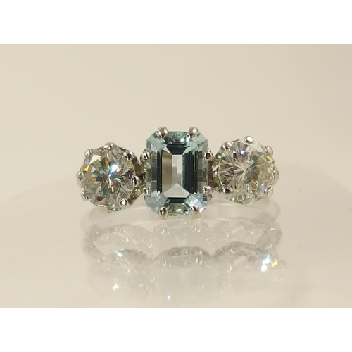 31 - An aquamarine and diamond ring