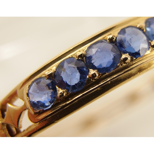 38 - A sapphire ruby and diamond bangle