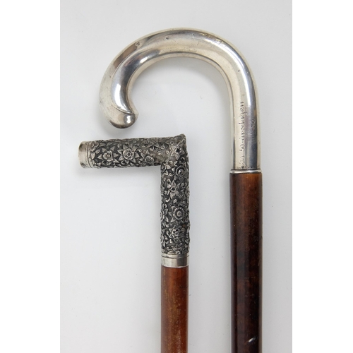 525 - A Chinese silver cane handle