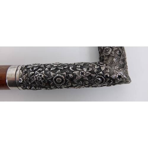 525 - A Chinese silver cane handle