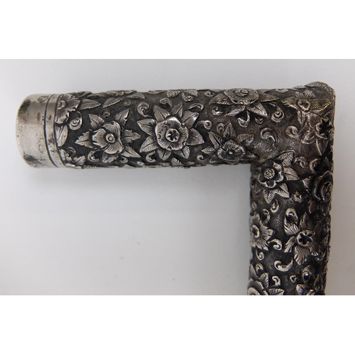 525 - A Chinese silver cane handle